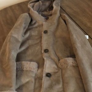 Beige women coat that was never worn.